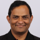Headshot of article author Mey Meenakshisundaram